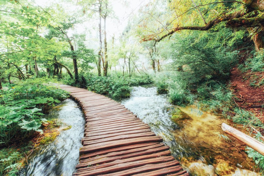 Plitvice Lakes National Park, tourist route on the wooden flooring along the waterfall